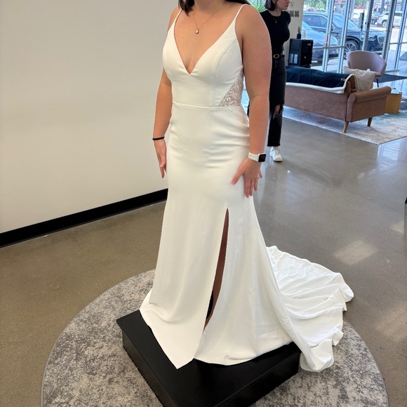 Unworn wedding dress size 12